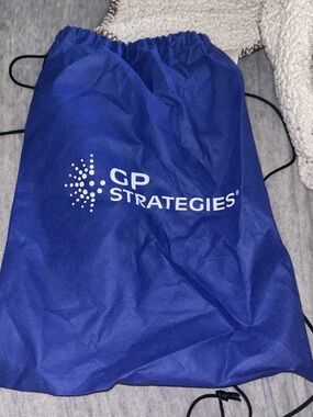 GP Strategies Blue And White Mesh Draw String Bag